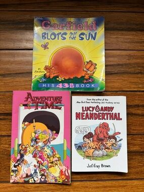 Set of 3 Graphic Novels - Garfield - Adventure Time - Lucy & Andy Neanderthal